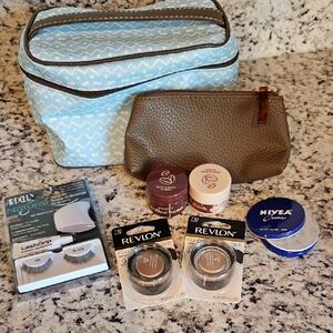 Vintage Estee Lauder Cosmetic Bags With Various Beauty Products